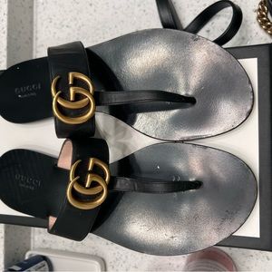 Black Gucci sandals